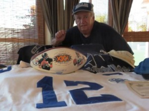 Ray Brown shows off Cowboys memorabilia.