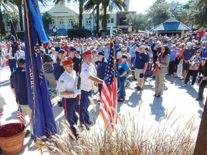 The Phillip DeLong Marine honor guard posts the colors at an event at Lake Sumter Landing.