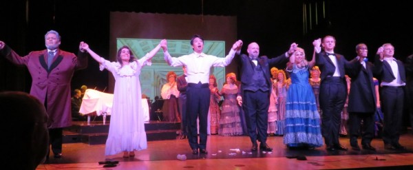 The cast takes a bow at the end of the show.