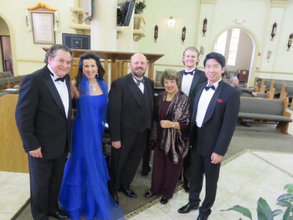 Opera Club President Gerri Piscitelli, third from right, and the performers.
