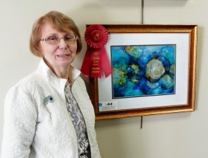 Second place finisher Adeline Curlett ,with her 'Under the Sea' fantasy in mixed media and ink on Yupo. jpg