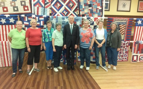 Gov. Rick Scott with The Villages Quilting Guild.