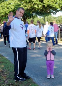 Tiny walker, Justyce, who's almost 3, with grandpa, Tal Elmore.