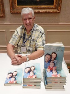 Volunteer Bob Hendrychs helped to distribute Rick and Karen Santorum's books.