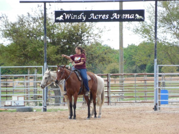 Riders work on technique in the arena at Windy Acres Farms.