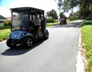 Golf carts travel down the multi-modal path along Buena Vista Boulevard.