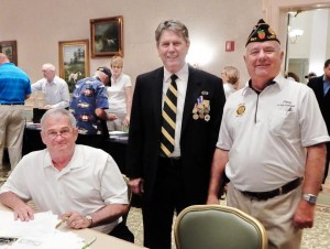 Hal Varrone and Vice Commandant Terry Briggs, from American Legion Post #347 in Lady Lake conferred with Vietnam war hero, Sam Altherr III.
