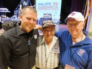 Kevin McDugle, left, Irv Locker and Harry Clark celebrate Honor Flight.