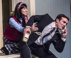  Corie (Katelyn Long) and Paul (Ryan Smith) playfully wrestle for the telephone. Photo Credit:  Steve Hlavac 