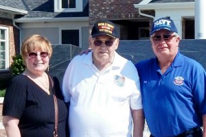 WW II veteran Tex Schooley posed outside the Eisenhower Recreation Center with his partner, Barbara Lewiski and guardian, Bob McPhee.