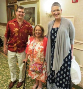 Indy Orchid Gala organizer Marie Bogdonoff is flanked by Greg Myre and Jennifer Griffin.