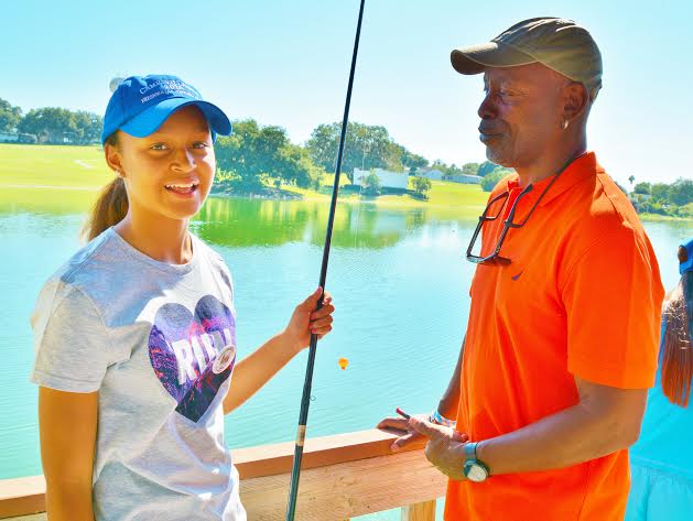 http://villages-news.com/wp-content/uploads/2015/06/Briar-Meadow-Villager-Keith-Franklin-gave-his-granddaughter-some-encouragement-at-the-pier..jpg