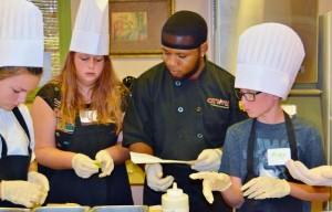 City Fire assistant chef, Jordan Howard, showed his team how to spread the mascarpone on their flats.