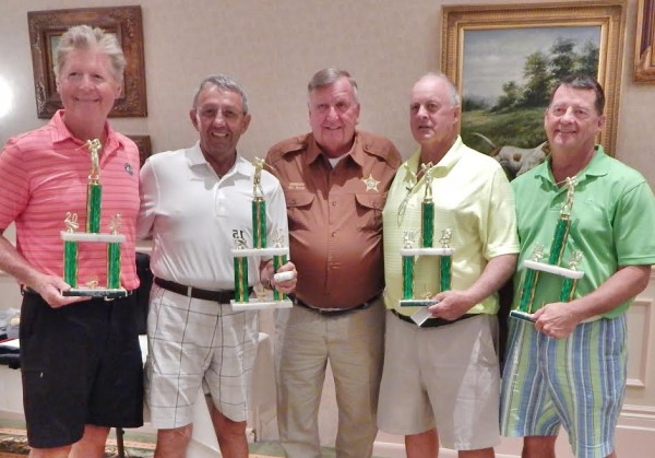 Sheriff Farmer, center, with tournament winners Steve Davis, Mike Doyle, Patrick O'Neill and Chuck Walter.