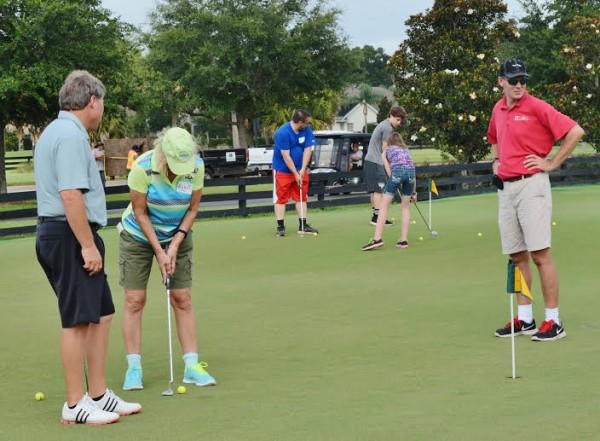 Camp Villagers received putting lessons on Tuesday.