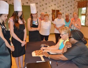 ​Villages Gourmet Club co-founder, Dottie Klein, and City Fire chef, Angela Pullen, judged the teams' desserts.