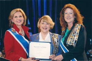 Carol Ann Peskin, center, accepts the national membership award.