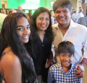 Mahesh Nomula and wife Sumita, with daughter Sami, far left, and son Ishran.