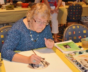 isitors enjoyed watching Diane Andrus create one of her popular pet paintings copy.