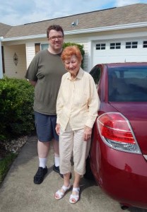 Donna Austin, shown here with neighbor and good friend, David Moon, is living each day to the fullest after her close call with lightning on July 1.