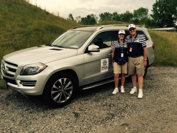 Nancy and Bill Petri with a Mercedes-Benz they use to evacuate players.