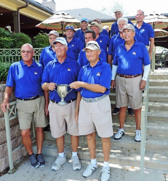 Team Evans Prairie holds the 2015 Village Cup trophy.