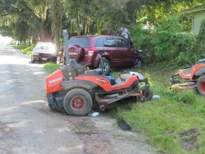 A woman riding on this mower was seriously injured when it was struck by an automobile.