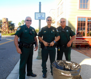 Deputy Dick Bennett, Lt. Robert Siemer and Deputy Jimmy Little, from left, were busy collecting medicine at the event.