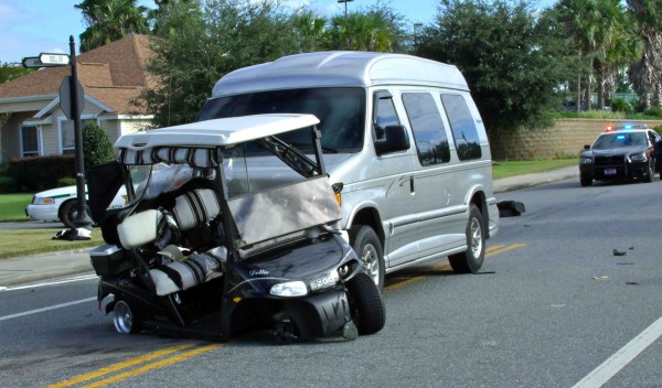 Van collides with golf cart on Odell Circle
