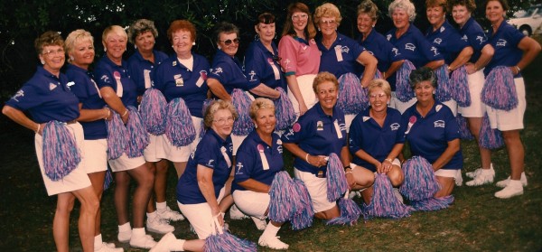 A group that preceded the Villages Cheerleaders cheered on contestants in "The Battle of the Sexes." Gerry Lynch is in the front row, second from left.