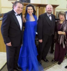 Oscar Feliu, left, and singer Laurie Arnold Bill Doherty and Villages Opera Club President Gerri Piscitelli.