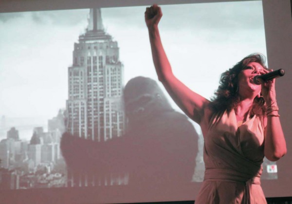 Suzie Casta and King Kong share a New York moment.