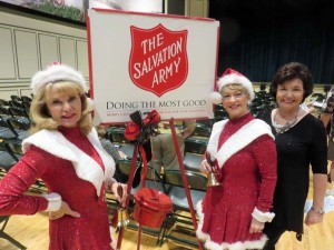 Debra Heath-Strickland, right, producer of the Christmas Spectacular joins Sandee Lorenzen left and Gay McCants to help the Salvation Army