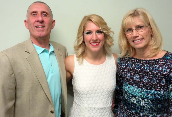 Taylor Rowland with her parents.