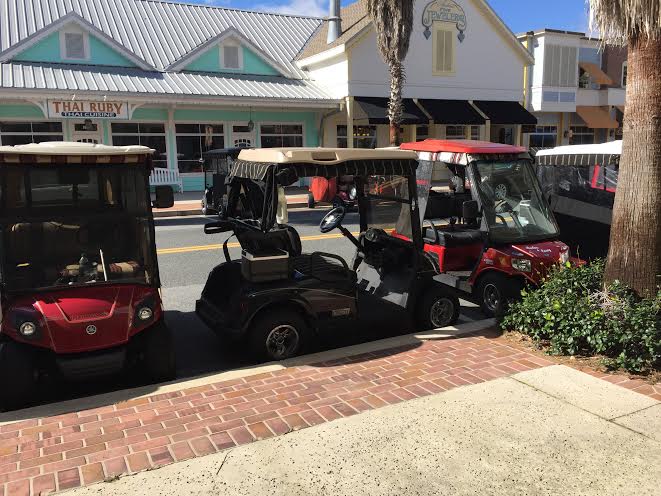 Golf cart parking at Lake Sumter Landing.
