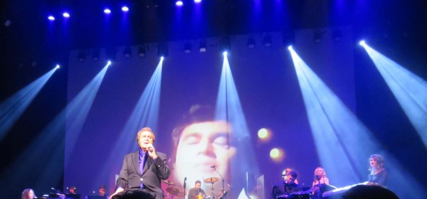 Engelbert Humperdinck sings on stage at The Sharon with his image on screen.