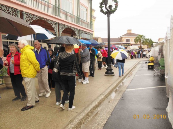 Villagers lined up in the rain Sunday to tour Katie Belle's.