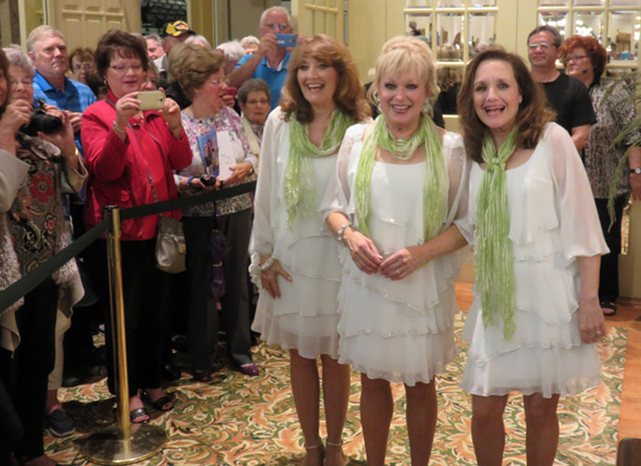 A bustling crowd of fans turned up in the Savannah Center lobby to snap pictures of the Lennon Sisters from left Kathy, Janet and Mimi.
