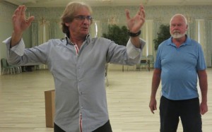 Ales Santoriello makes a point with Dave Olsen during rehearsal.