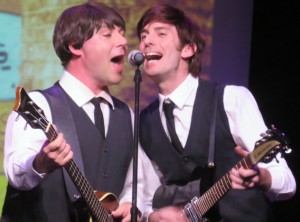 Beatles Celebration Band members, from left, Karl Lornie and Pete Mitchell make like Paul and John.