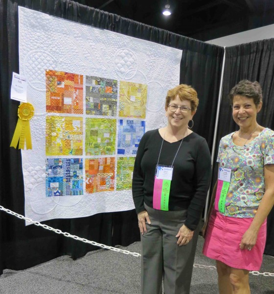 Lora Douglas and Villager Linda Hungerford, from left, with their third place quilt.