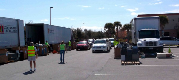 Vehicles line up to drop off electronic items at the VHA recycling drive. 