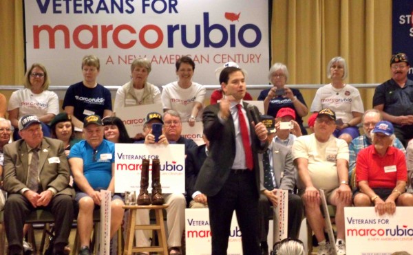 Marco Rubio gestures as he speaks to the crowd at the Rohan Recreation Center.