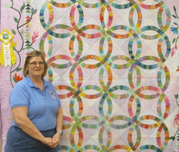 Susan Woodbury with her award winning quilt.