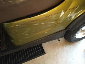 The golf cart was gashed  on the drirver's side in the accident.