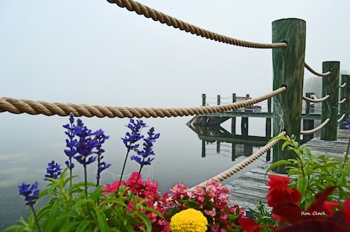 Foggy morning on Lake Sumter Landing boardwalk in The Villages