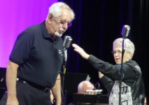 George Delmonte sings as Jean Butler conducts The Villages Swing Band.