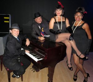 Paul Vesco, second from left, leads the Johnny Cool Swing Band with Clark Barrios and France Neil, far right. and Cathy Merkel.