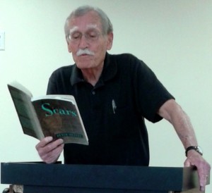 Poet Laureate of Florida Peter Meinke reads his work Tuesday at Belvedere Library.