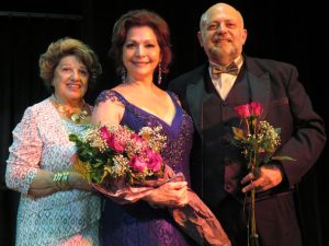 Gerri Piscitelli, left, president of The Opera Club of The Villages with soprano Karen Notare and Maestro Bill Doherty